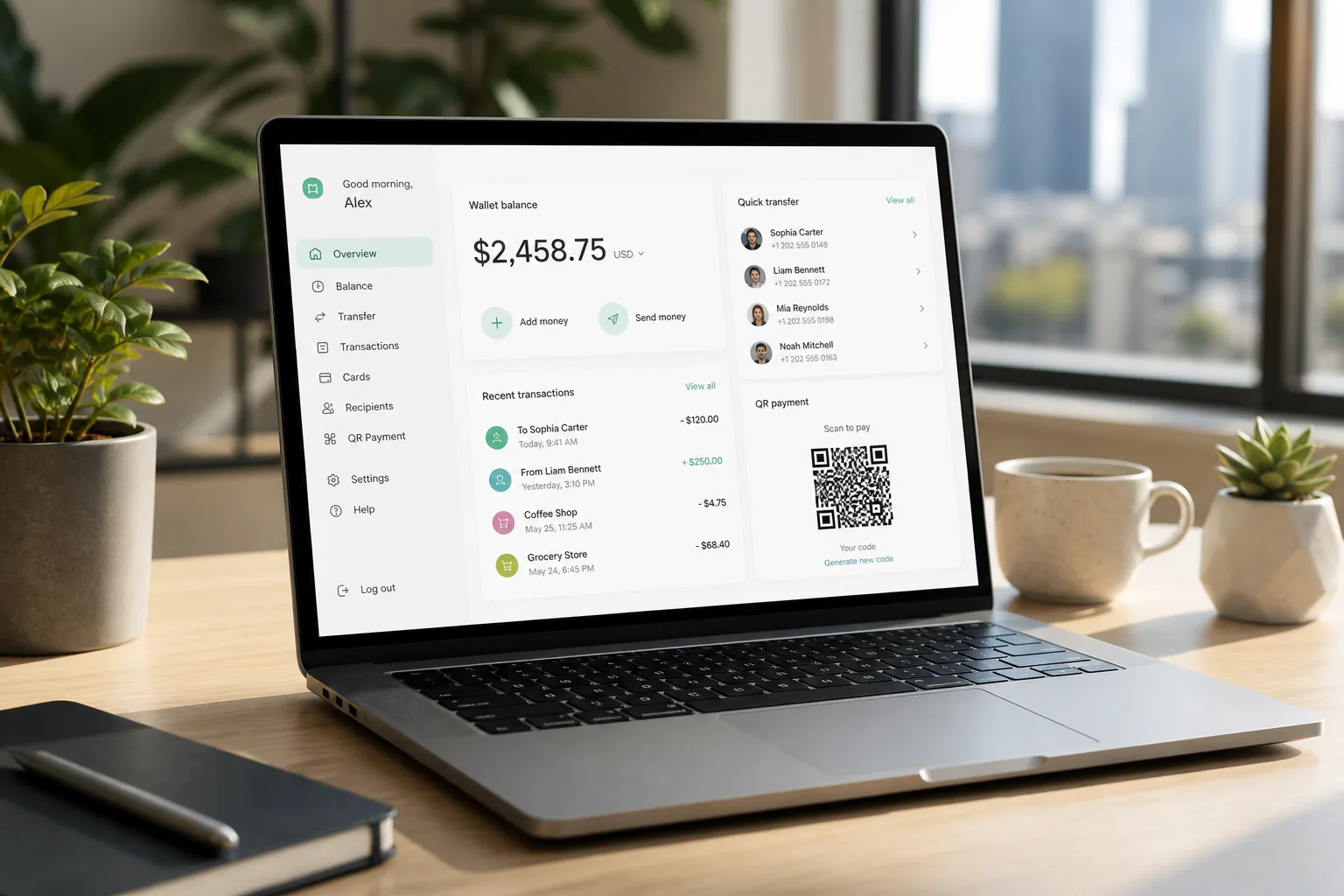 Laptop showing a digital wallet platform dashboard with payments, transfers, and fintech analytics