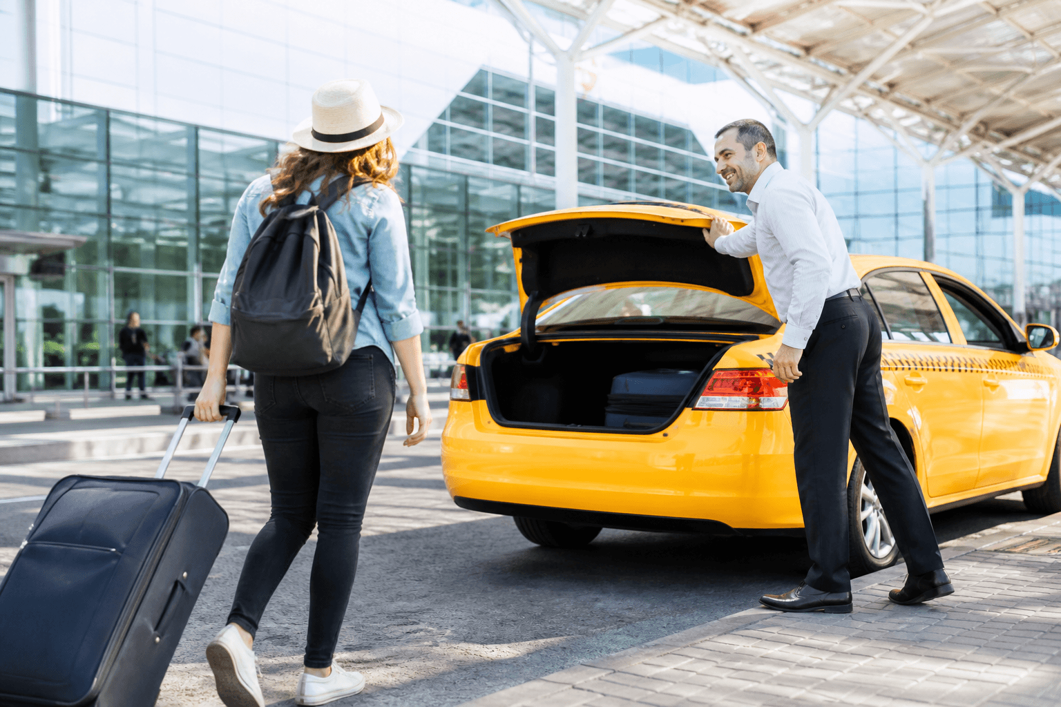 Airport taxi booking solution with traveler and pickup curb