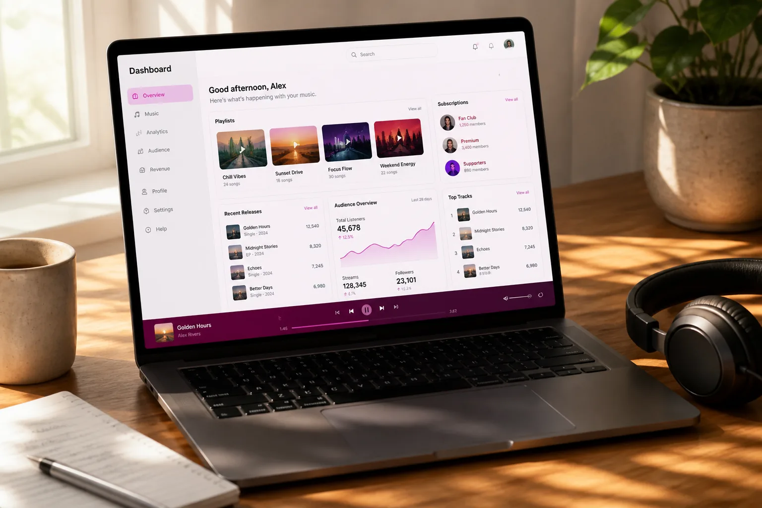 Laptop showing a music streaming platform dashboard with playlists, subscriptions, and listener analytics